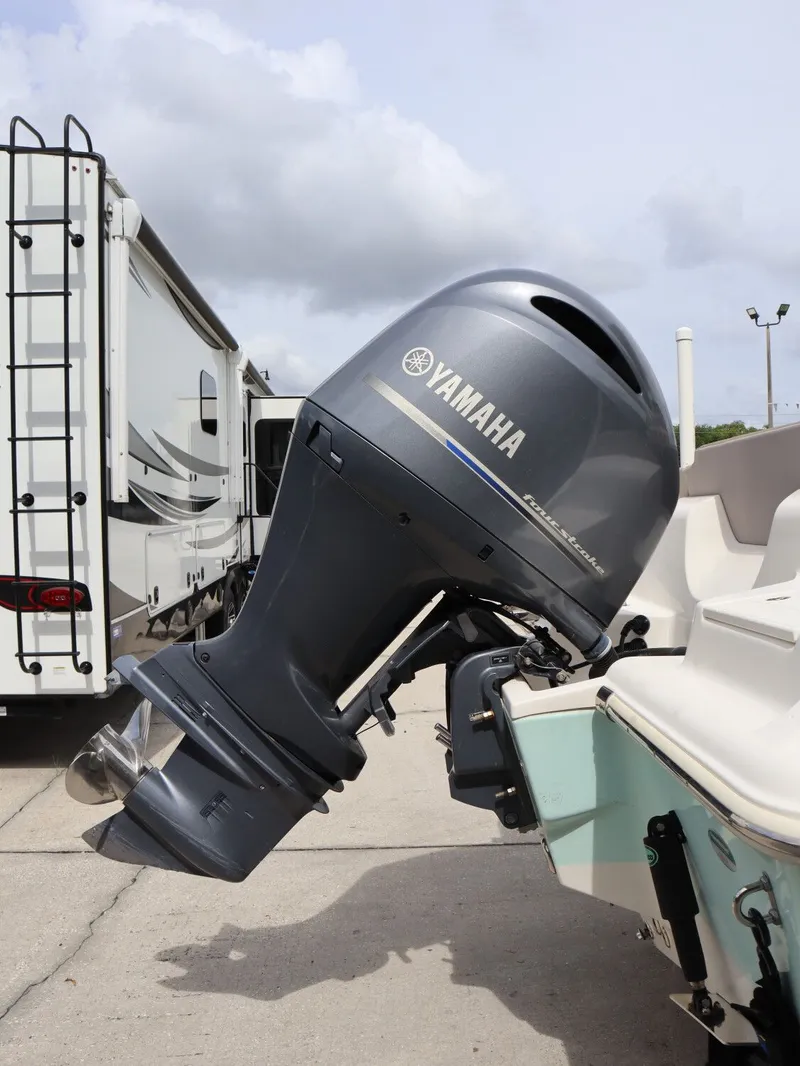 Slide: The Image of Yamaha outboard motor on Key West Center Console 219FS, 2021. - 11