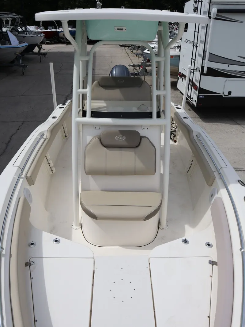Slide: The Image of 2021 Key West Center Console 219FS boat with seating area. - 16