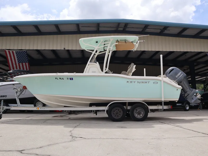 Slide: The Image of 2021 Key West Center Console 219FS boat on trailer. - 2