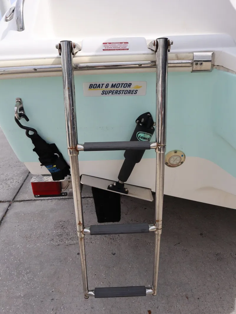 Slide: The Image of Ladder on the stern of a 2021 Key West Center Console 219FS boat. - 20