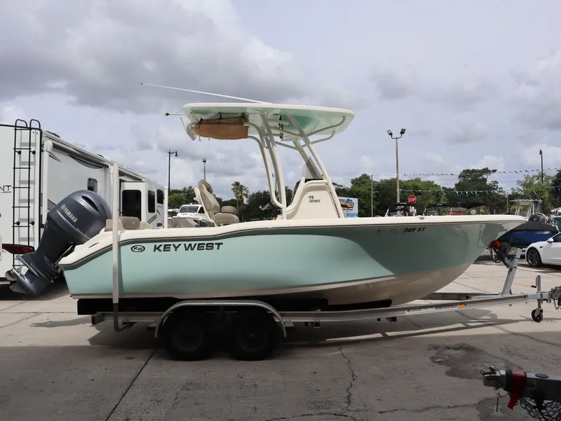Slide: The Image of 2021 Key West Center Console 219FS boat on trailer. - 6