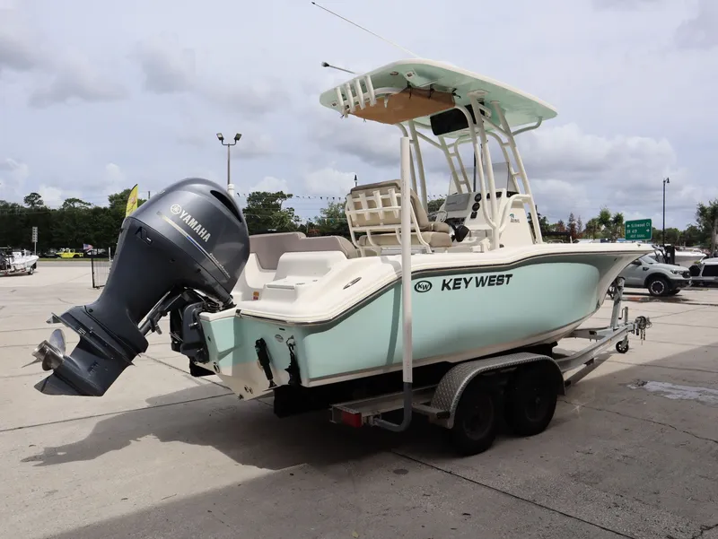 Slide: The Image of 2021 Key West Center Console 219FS boat on trailer. - 7