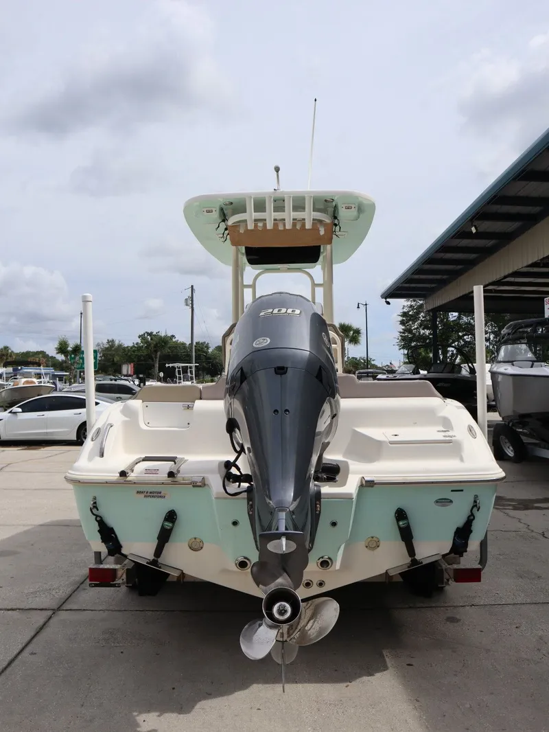 Slide: The Image of Rear view of a 2021 Key West Center Console 219FS boat at the dock. - 8
