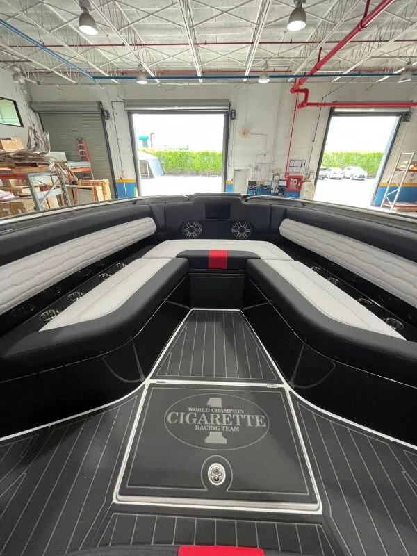 Slide: The Image of Interior of 2025 Cigarette 41' Nighthawk with luxurious seating arrangement. - 12