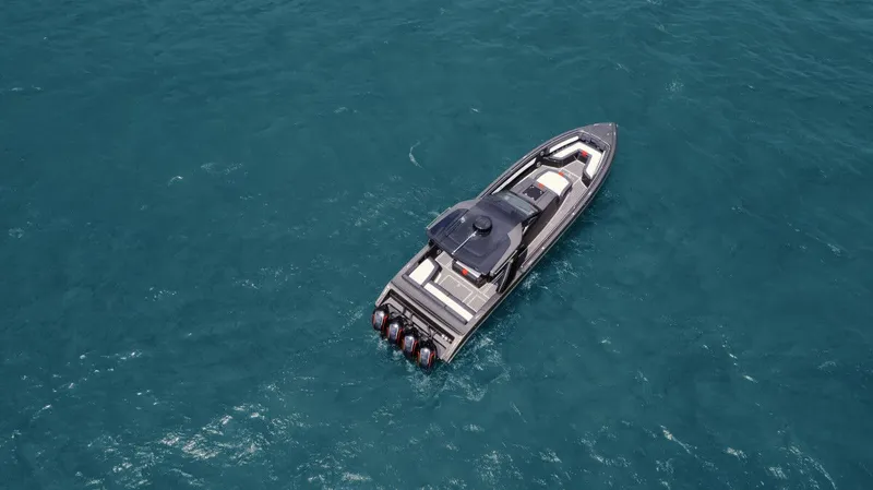 Slide: The Image of Aerial view of Cigarette 41' Nighthawk 2025 on open sea. - 16