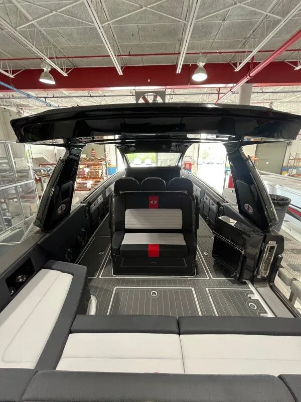 Slide: The Image of Interior of 2025 Cigarette 41' Nighthawk with luxurious seating. - 6