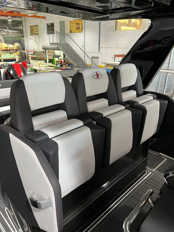 Slide: The Image of Interior of 2025 Cigarette 41' Nighthawk featuring luxurious seating. - 7