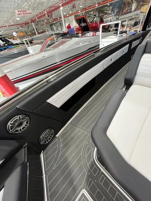 Slide: The Image of Interior of 2025 Cigarette 41' Nighthawk with modern seating and speakers. - 9