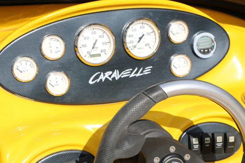 Slide: The Image of Dashboard of 2012 Caravelle Interceptor 232 Bow Rider with gauges and steering wheel. - 36