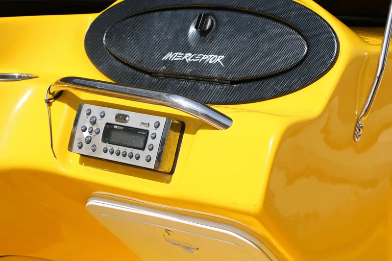 Slide: The Image of Yellow Caravelle Interceptor 232 Bow Rider dashboard with Sirius radio, 2012 model. - 38