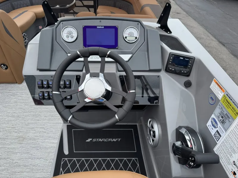 Slide: The Image of 2026 Starcraft SLS-5 Q DH helm with steering wheel and controls. - 11