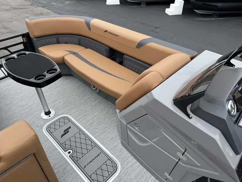 Slide: The Image of Interior of a 2026 Starcraft SLS-5 Q DH boat with beige seating. - 18
