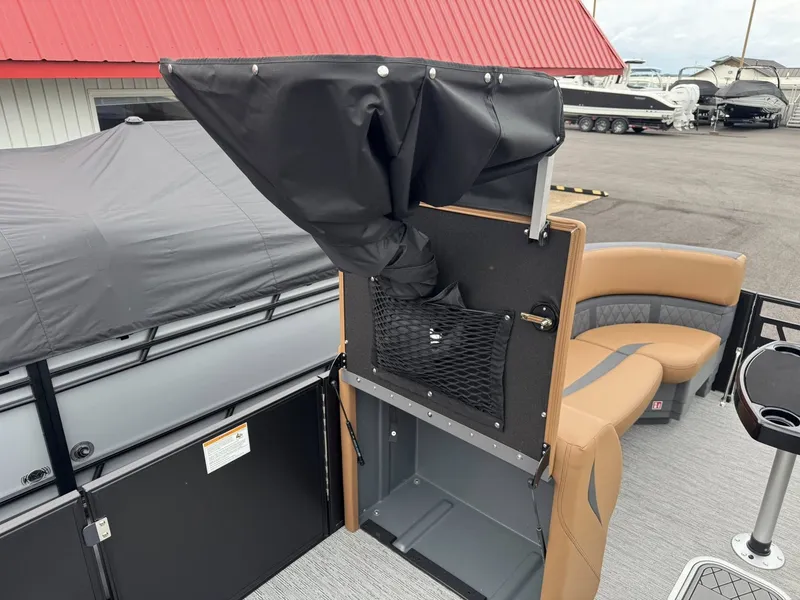 Slide: The Image of Starcraft SLS-5 Q DH 2026 pontoon boat with seating and storage area. - 7