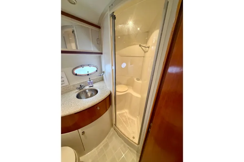 Slide: The Image of Bathroom interior of 2000 Carver 396 Motor Yacht with shower and sink. - 28