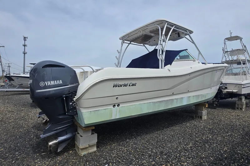 Slide: The Image of 2015 World Cat 295 DC boat with Yamaha engine on dry dock. - 20