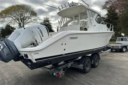 Slide: The Image of 2020 Pursuit OS 325 Offshore boat on trailer with Yamaha engines. - 7