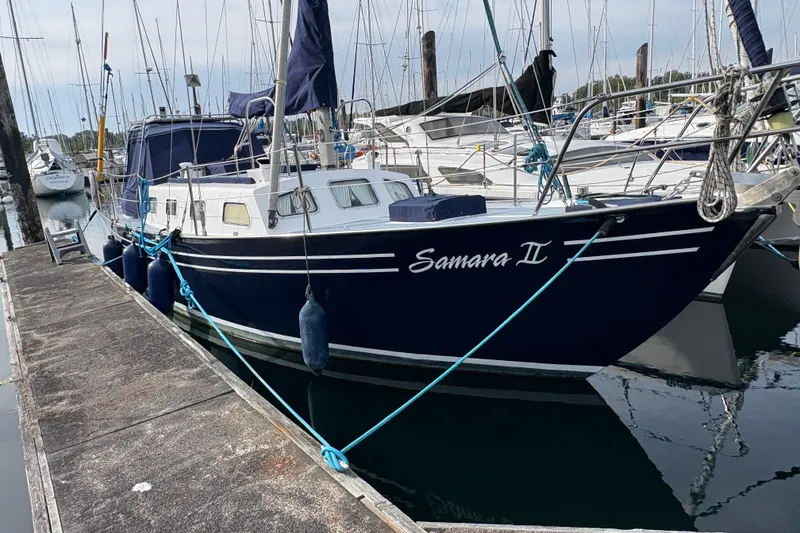 The Image of 1977 Folkes Full Keel Offshore Cutter "Samara II" docked at marina. - 0