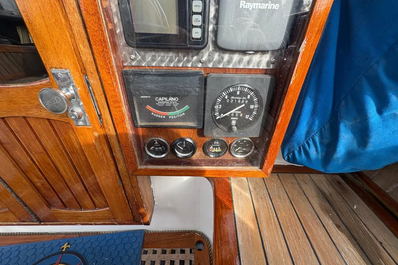 Slide: The Image of Control panel of a 1977 Folkes Full Keel Offshore Cutter sailboat. - 27