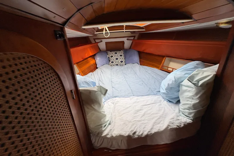 Slide: The Image of Cozy cabin interior of 1977 Folkes Full Keel Offshore Cutter with comfortable bedding. - 43