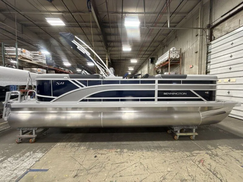 The Image of 2026 Bennington 22SSR pontoon boat in warehouse. - 1