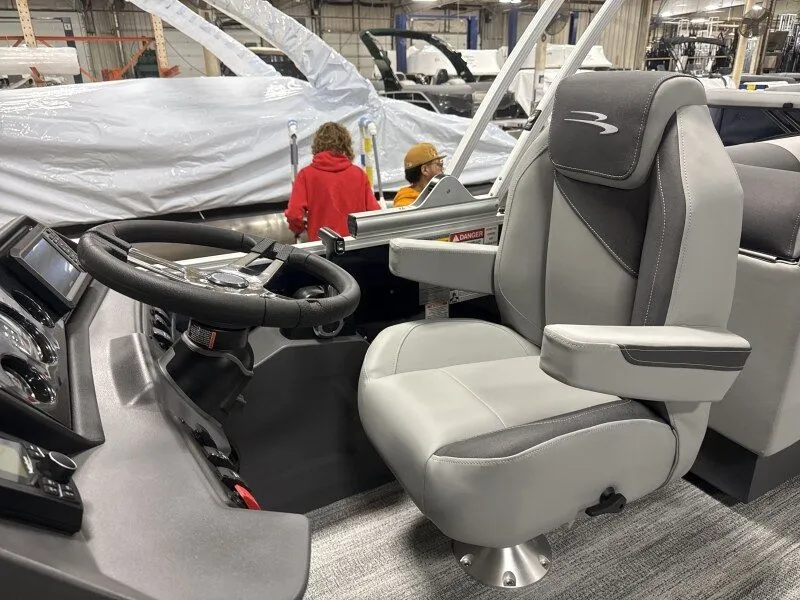 Slide: The Image of Interior of 2026 Bennington 22SSR with steering wheel and seat. - 15