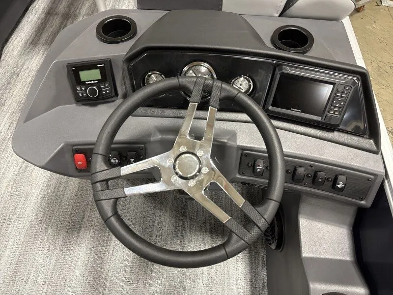 Slide: The Image of Dashboard of 2026 Bennington 22SSR with steering wheel and instruments. - 16