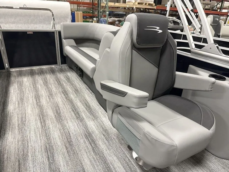 Slide: The Image of Interior of 2026 Bennington 22SSR with luxurious gray seating. - 17