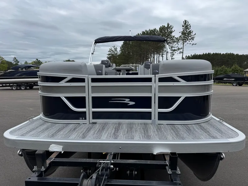 Slide: The Image of 2026 Bennington 22SSR pontoon boat on a trailer. - 27