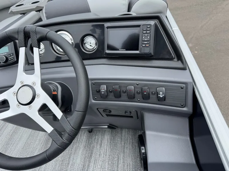 Slide: The Image of Dashboard of 2026 Bennington 22SSR with steering wheel and controls. - 37