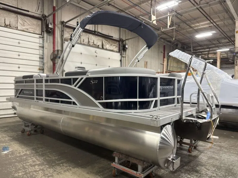 Slide: The Image of 2026 Bennington 22SSR pontoon boat in warehouse. - 6