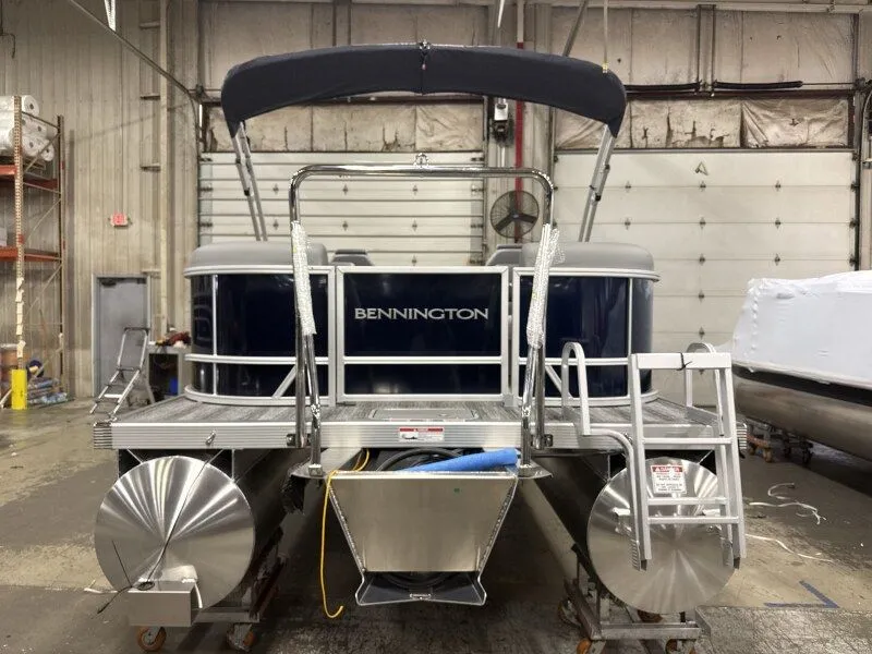 Slide: The Image of Bennington 22SSR 2026 pontoon boat in a workshop. - 7