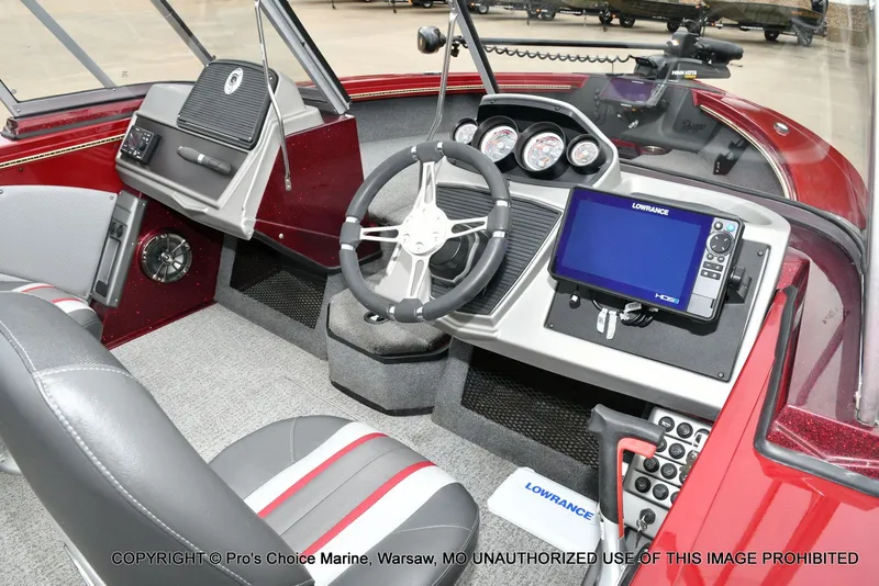 Slide: The Image of Interior of Ranger VX1888 WT boat with steering and electronics. - 35