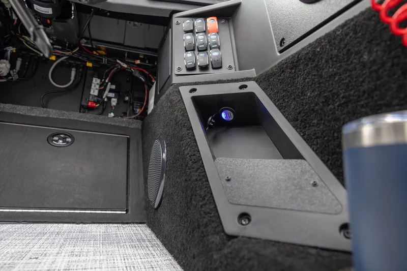 Slide: The Image of Interior of 2026 Alumacraft Trophy 195X Sport with electronics and speaker. - 16