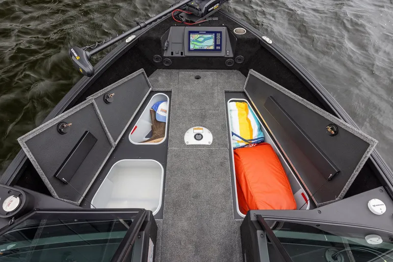 Slide: The Image of Interior view of 2026 Alumacraft Trophy 195X Sport with storage compartments. - 17