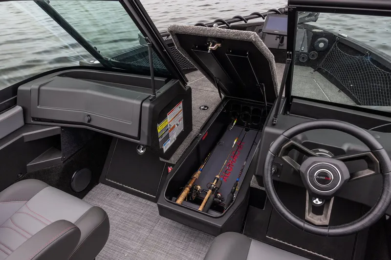 Slide: The Image of Interior of 2026 Alumacraft Trophy 195X Sport with fishing rod holder. - 18