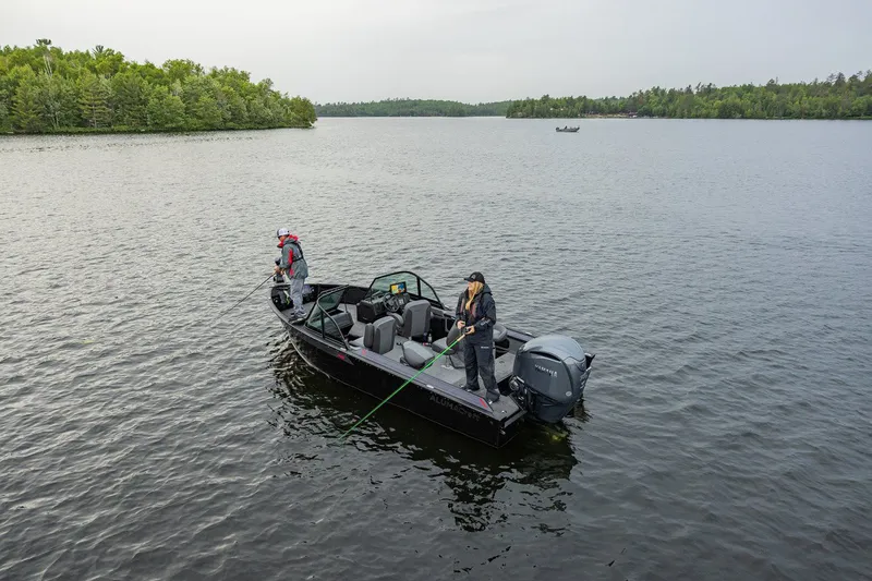 Slide: The Image of 2026 Alumacraft Trophy 195X Sport fishing on a calm lake. - 21