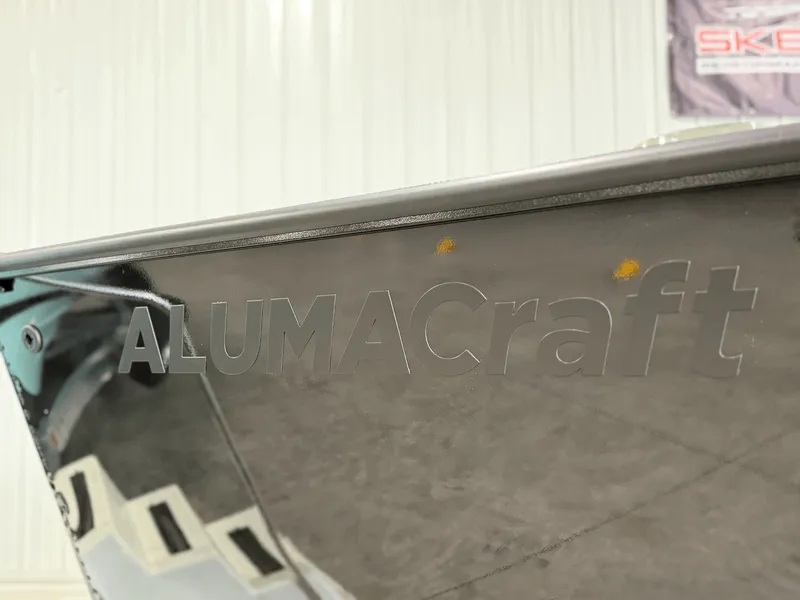 Slide: The Image of Alumacraft Trophy 195X Sport 2026 boat with logo detail. - 4