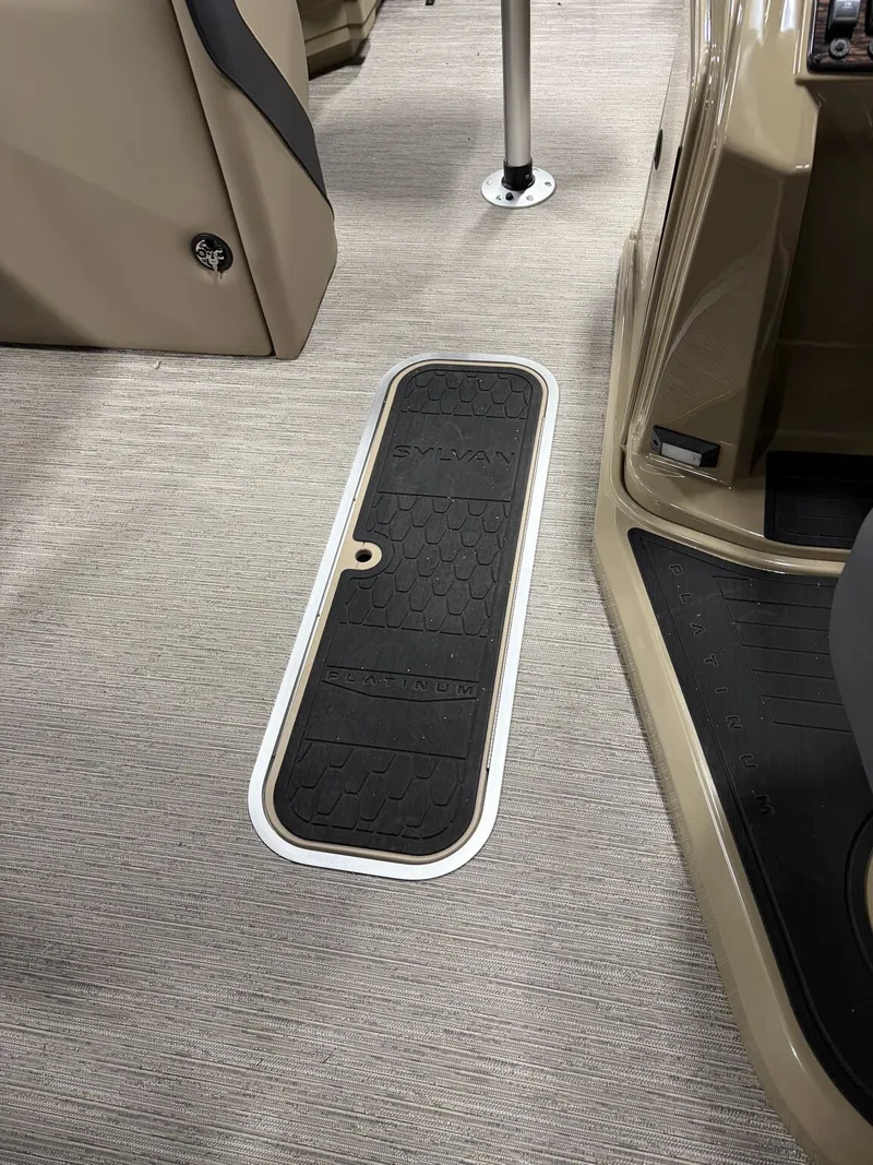 Slide: The Image of Sylvan Mirage X 2026 boat floor with storage hatch. - 6