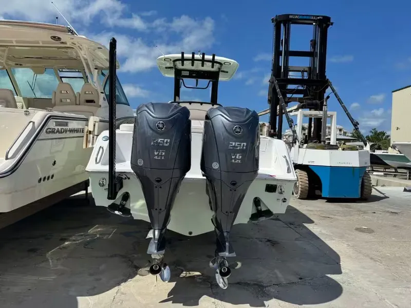 Slide: The Image of 2023 Sea Hunt Ultra 275 SE with dual outboard engines. - 4