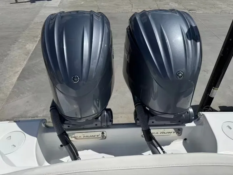 Slide: The Image of 2023 Sea Hunt Ultra 275 SE with dual outboard engines. - 5