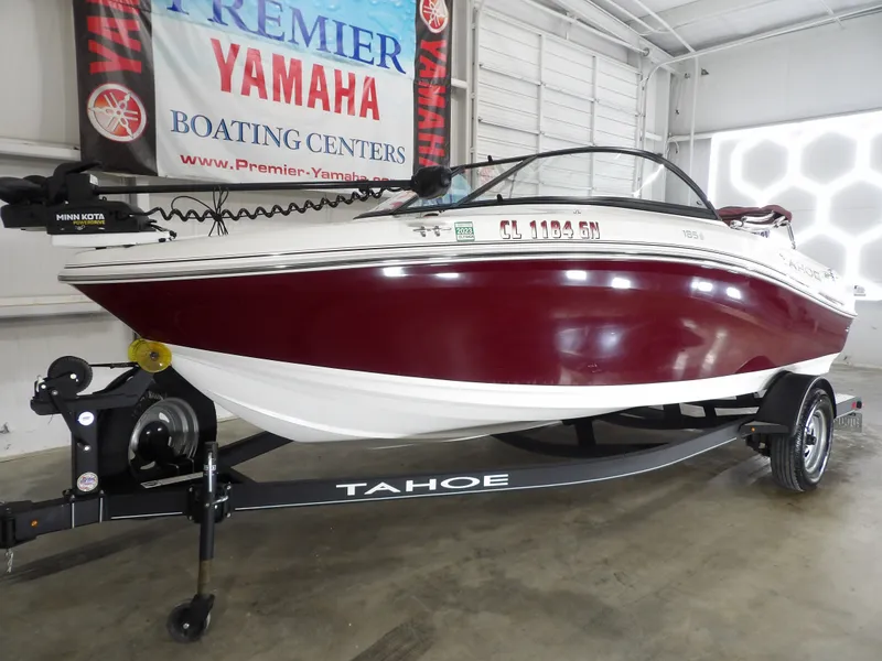 Slide: The Image of 2022 Tahoe 185 boat on trailer in warehouse. - 3