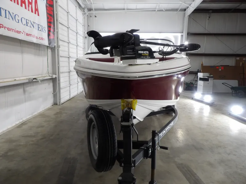 Slide: The Image of 2022 Tahoe 185 boat in warehouse, front view. - 7