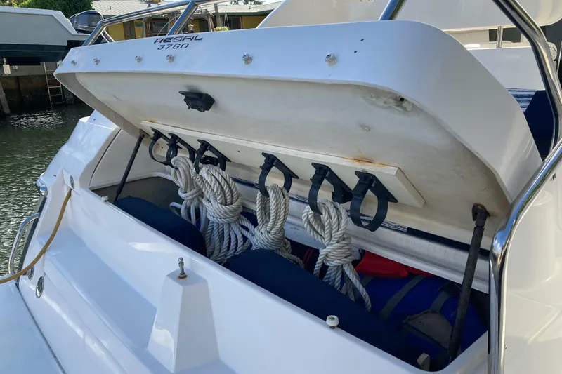 Slide: The Image of 2007 Regal 3760 Commodore boat storage compartment with neatly coiled ropes. - 15
