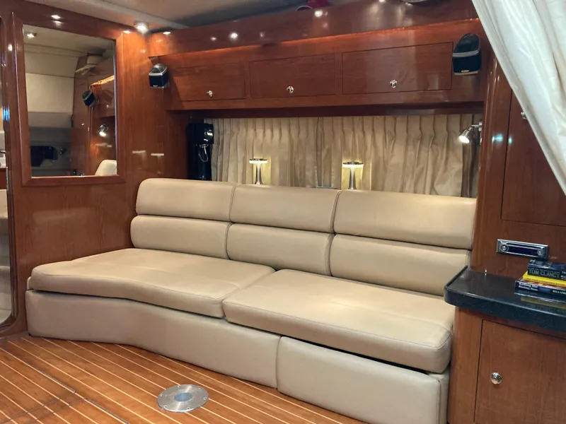 Slide: The Image of Luxurious interior of 2007 Regal 3760 Commodore yacht with beige leather seating. - 35