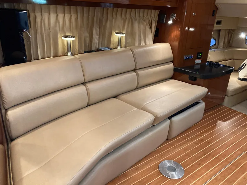 Slide: The Image of Luxurious interior of 2007 Regal 3760 Commodore yacht with beige leather seating. - 39