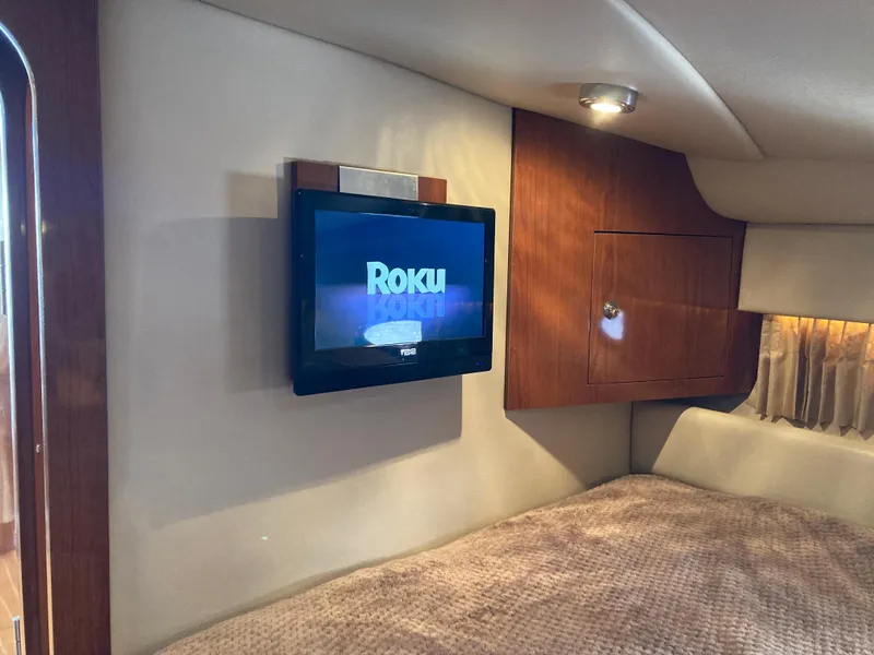 Slide: The Image of Interior of 2007 Regal 3760 Commodore with wall-mounted Roku TV. - 44