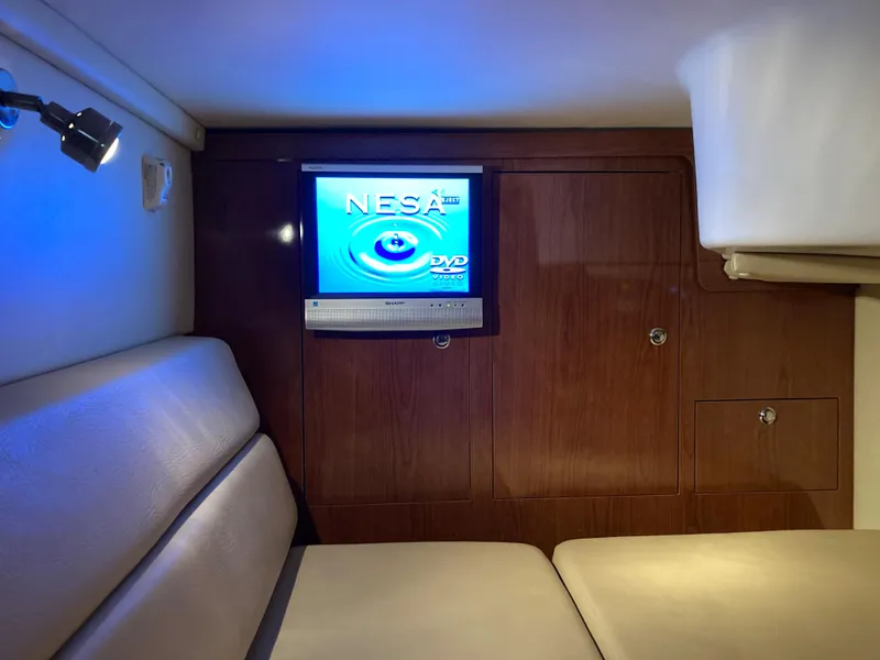 Slide: The Image of 2007 Regal 3760 Commodore cabin with TV and comfortable seating. - 48