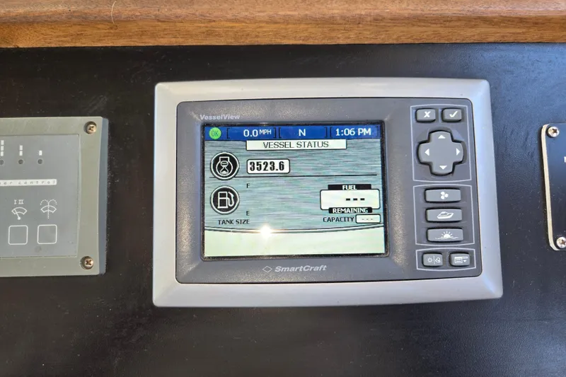 Slide: The Image of SmartCraft VesselView display on 2012 American Tug 365 Flybridge, showing vessel status and fuel information. - 40
