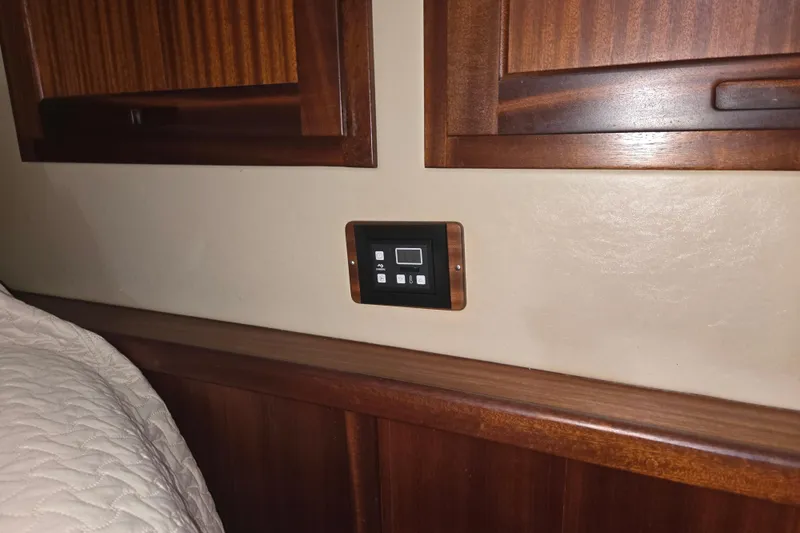 Slide: The Image of Control panel on American Tug 365 Flybridge 2012, wooden interior detail. - 46
