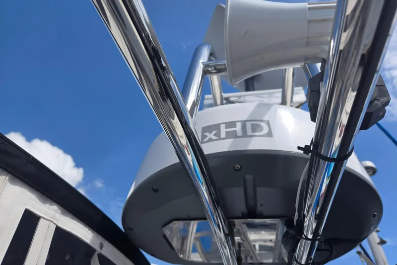 Slide: The Image of Radar equipment on 2012 American Tug 365 Flybridge against blue sky. - 82